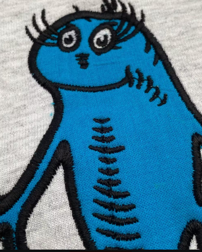 Image of embroidered dr Seuss Blue Fish Blucatreddog.is
